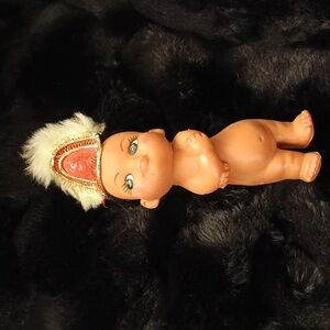 Vintage Doll with Feathered Hat.